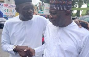 Kogi State Commissioner for Solid Minerals and Natural Resources, Engr. Abubakar Bashir Gegu (L) and Senator Representing Kogi West Senatorial District, Sunday Steve Karimi