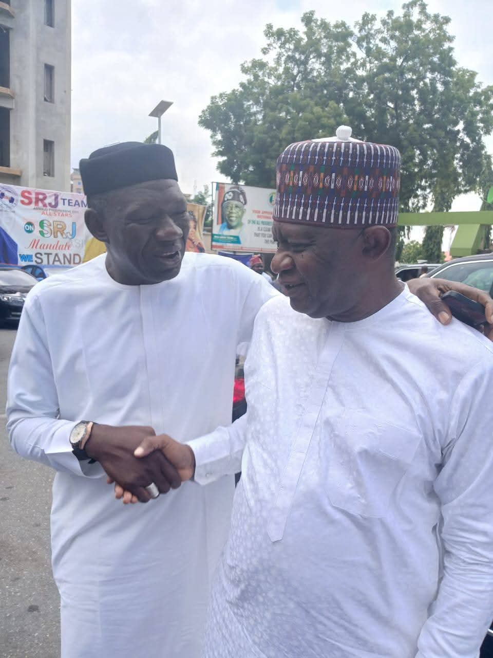 Kogi State Commissioner for Solid Minerals and Natural Resources, Engr. Abubakar Bashir Gegu (L) and Senator Representing Kogi West Senatorial District, Sunday Steve Karimi