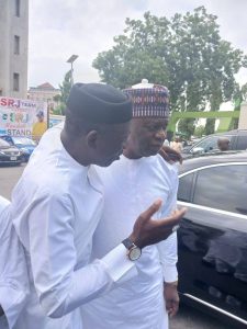Kogi State Commissioner for Solid Minerals and Natural Resources, Engr. Abubakar Bashir Gegu (L) and Senator Representing Kogi West Senatorial District, Sunday Steve Karimi 
