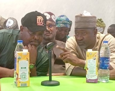 Chairman of Kwali Area Council Hon Danladi Chiya with the chairman -elect of the council Hon Nuhu Daniel Kwali during the inauguration of the council executives on Tuesday.