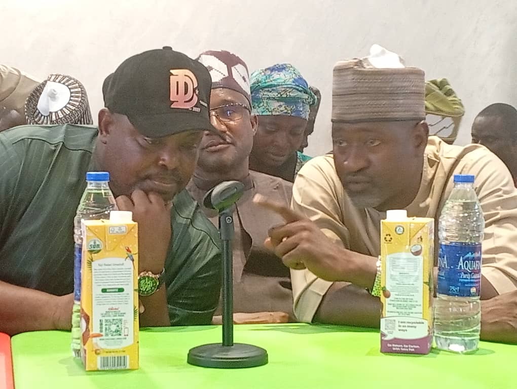 Chairman of Kwali Area Council Hon Danladi Chiya with the chairman -elect of the council Hon Nuhu Daniel Kwali during the inauguration of the council executives on Tuesday.