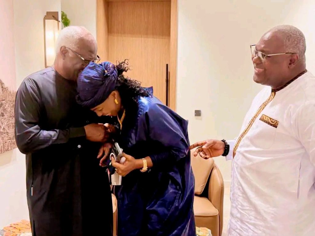 Ernest Bai Koroma and Alpha Kanu during an interaction at the ECOWAS Summit.