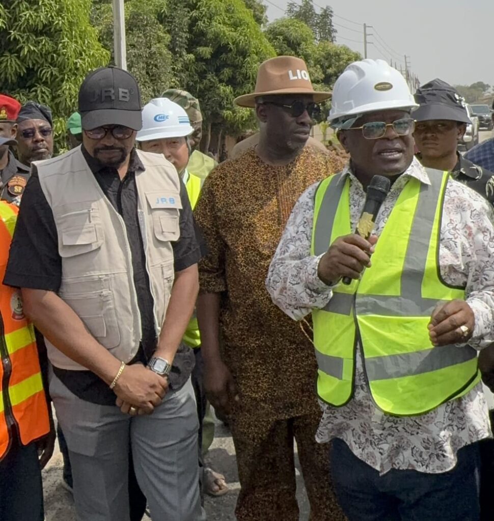 JRB Construction Chairman Jimoh Rauf Badamasi, Minister of Works David Umahi and engineers during one of the company’s road infrastructure projects.